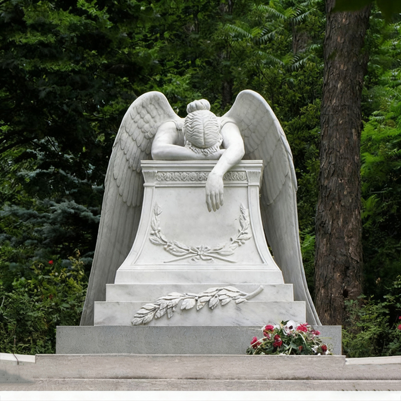 Lehajtott fejű angyal márvány sírkő